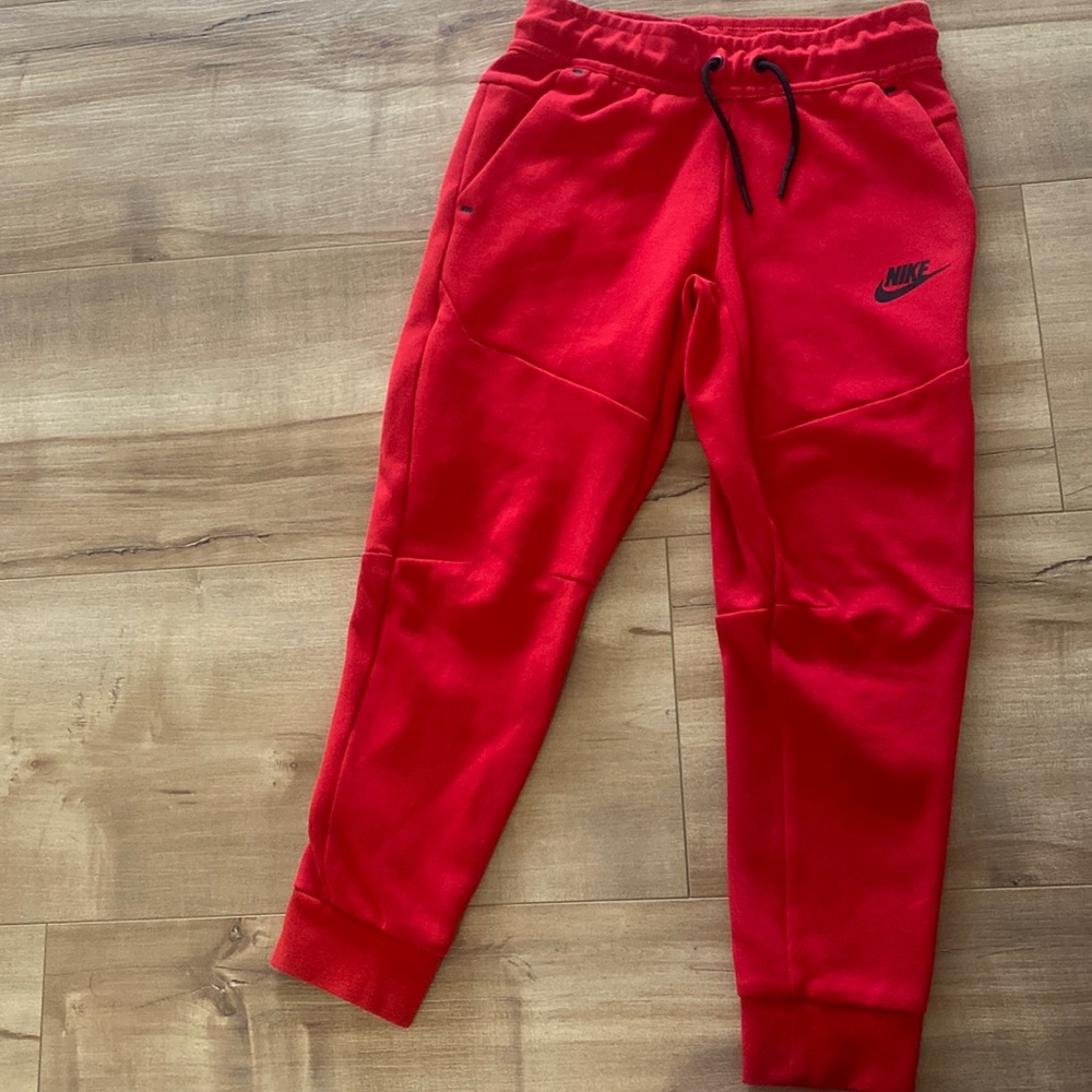 New Red Nike Sportswear Tech pants